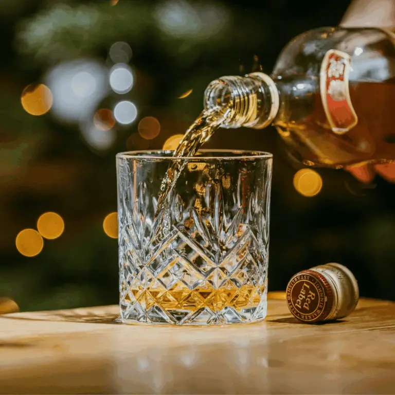 Whiskey being poured into a glass
