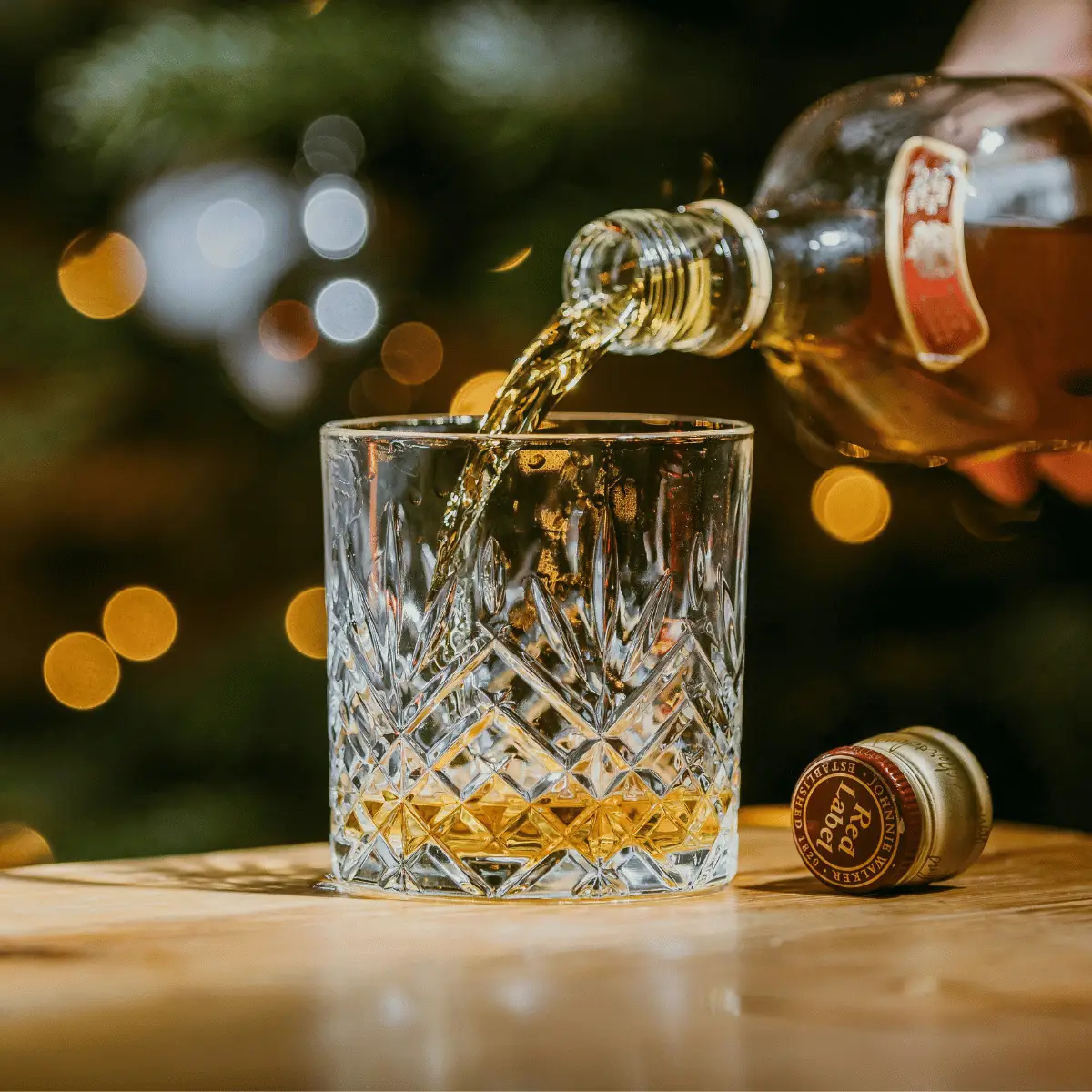 Whiskey being poured into a glass