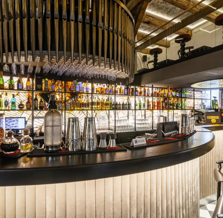 Round bar with backlit liquor shelves